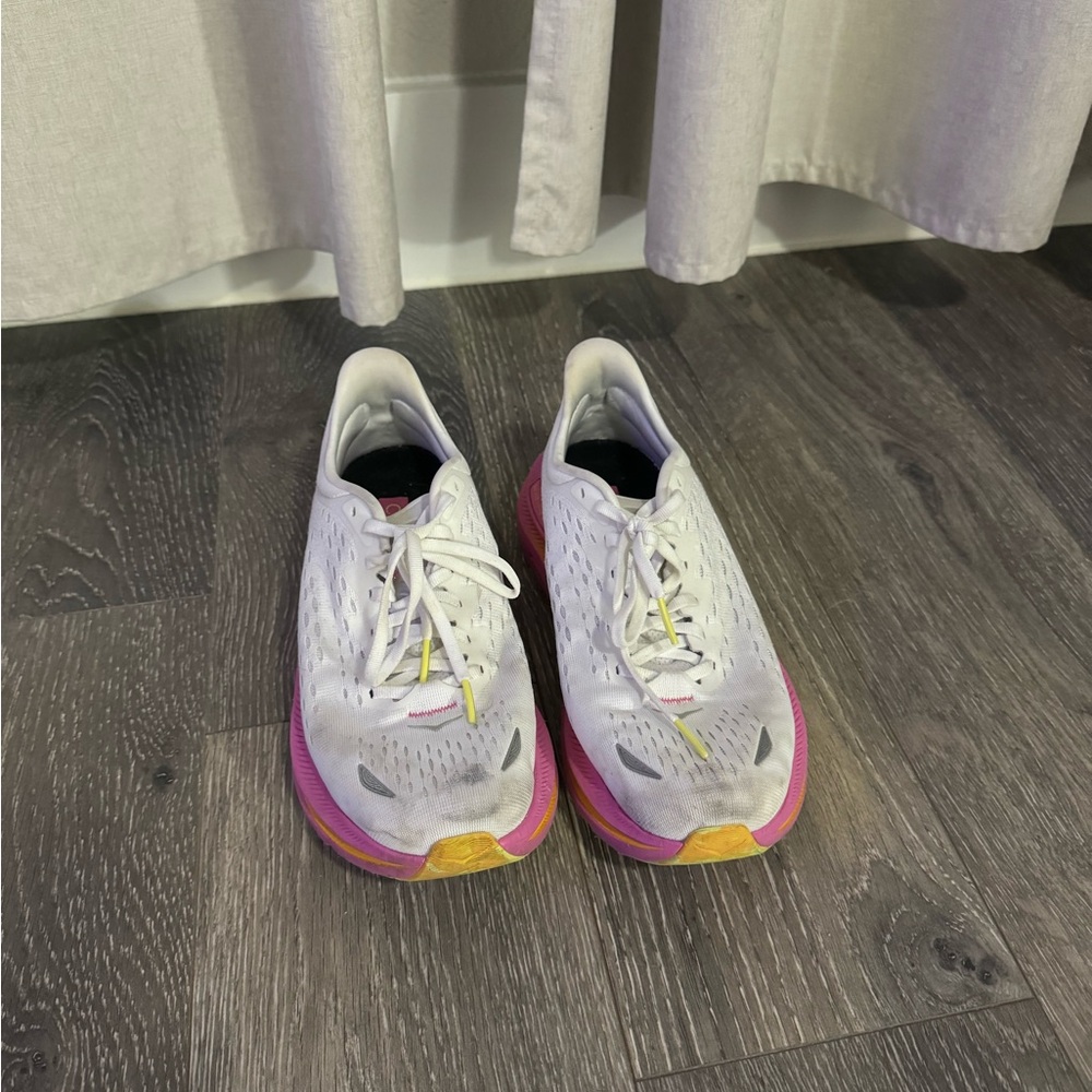 Hoka white and pink shoes